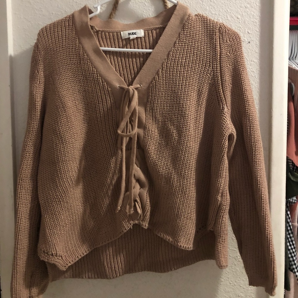 Knit sweater with tie up details